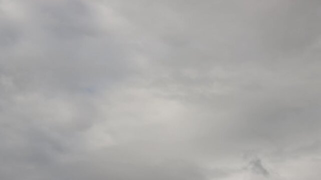 Time elapse of rolling clouds before rain
