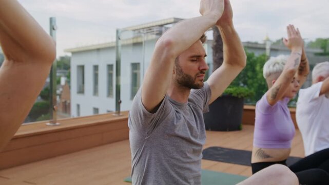 Old parents with adult children practice yoga together at hotel - Powered by Adobe