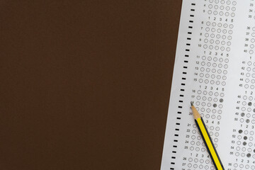 close up pencil on answer sheets, education concept
