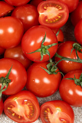 Lots of ripe fresh cocktail tomatoes close-up.