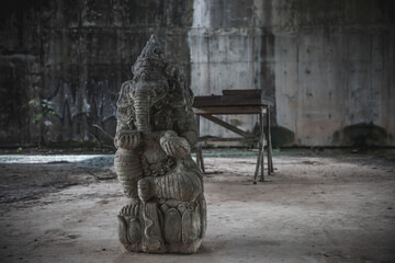  Old broken statue in abandoned hotel. Shabby statue. Scary abandoned hotel. Dirty item.