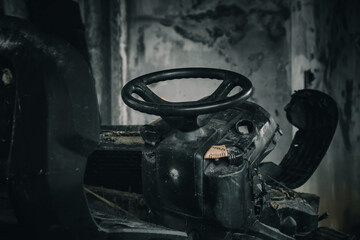 Abandoned tractor in an old abandoned hotel. Abandoned machinery.