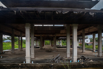 Old abandoned hotel in the jungle. Shabby walls. Beautiful abandoned hotel.