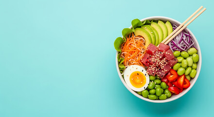Colorful Poke Bowl with Tuna Veggies and Egg on Light Blue Background