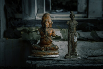  Old broken statue in abandoned hotel. Shabby statue. Scary abandoned hotel. Dirty item.