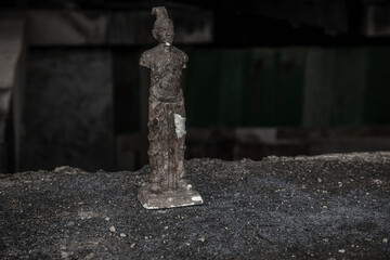  Old broken statue in abandoned hotel. Shabby statue. Scary abandoned hotel. Dirty item.