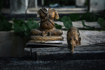  Old broken statue in abandoned hotel. Shabby statue. Scary abandoned hotel. Dirty item.