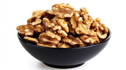 Fresh Raw Walnuts in a Black Bowl with Bright White Background