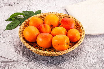 Raw ripe sweet apricots heap