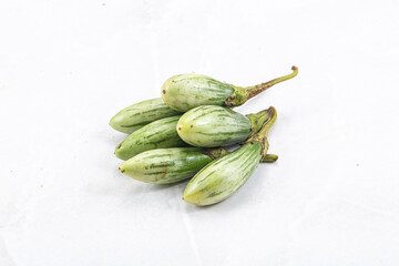 Small organic young green eggplant