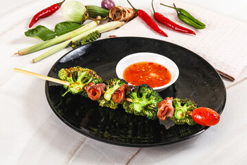 Thai Street foof satay with bacon and broccoli