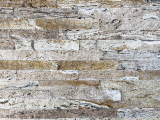 Old stone wall of a building. Stone wall as background or rustic pattern for wallpaper. High quality photo