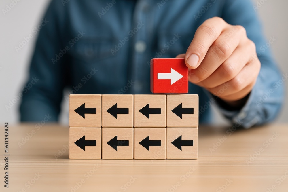 Poster the power of choice: a hand strategically places a red arrow block, signifying a pivotal decision, c