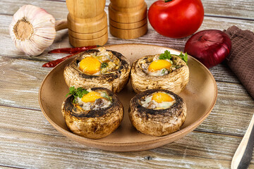 Baked champignon with quail egg