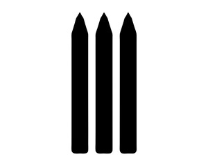 Three black wooden stakes or posts arranged in a vertical row