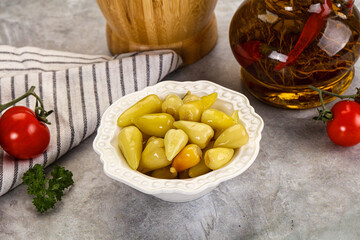 Turkish traditional marinated mini chili peppers