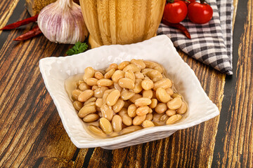 Baked white canned beans in the bowl