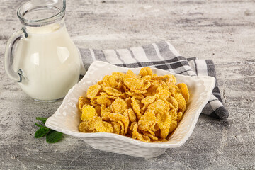 Corn flakes with milk for breakfast