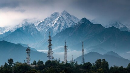 Snowy mountain range with communication towers