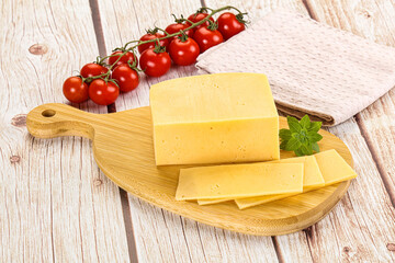 Yellow cheese piece with slices