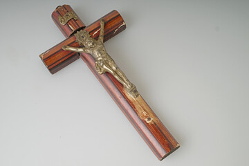 Symbolic antique Catholic Crucifix on white