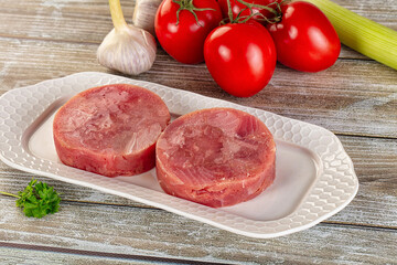 Raw round tuna fish fillet