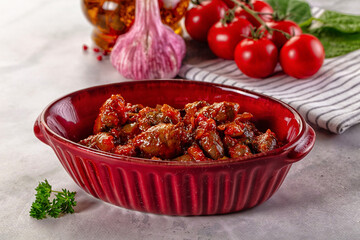 Roasted chicken hearts with vegetables