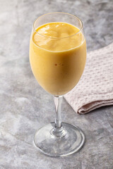 Sweet mango smoothie dessert glass