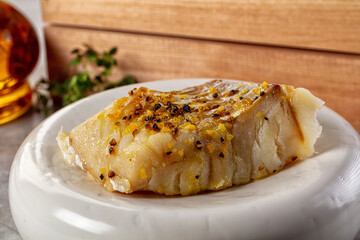 Steamed cod fish fillet with spices