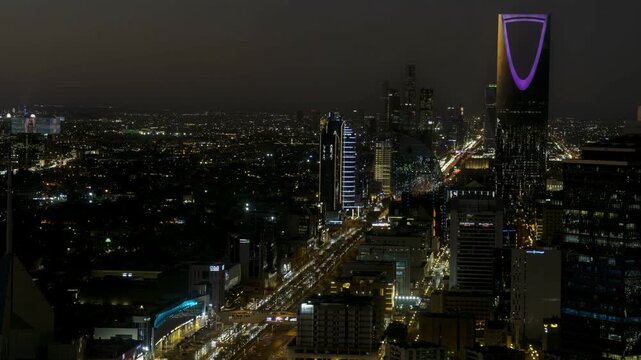 Breathtaking timelapse from the top of Faisaliah Tower, the sunset view of the skyline of Riyadh, Saudi Arabia, dominated by the iconic Kingdom Centre
