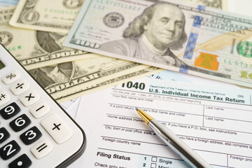 Obraz premium Tax form 1040 U.S. Individual Income Tax Return, business finance concept.
