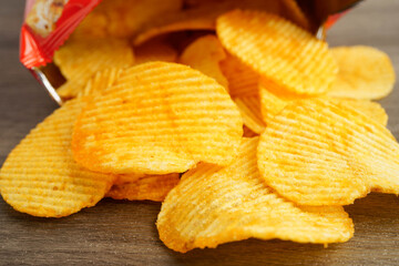 Potato chips , delicious BBQ seasoning spicy for crips, thin slice deep fried snack fast food.