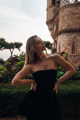 A beautiful lady walking through the grand halls of an ancient castle
