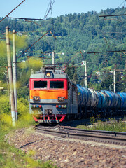 Freight train pulled by an electric locomotive on the Trans-Siberian Railway