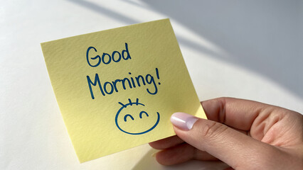 &ldquo;Good Bye&rdquo; Handwritten Sticky Note with Smiley and Heart &ndash; Farewell Message on Laptop Touchpad