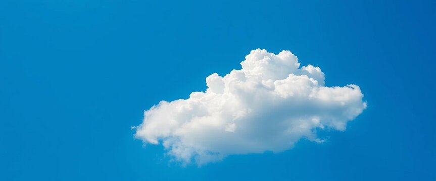 A fluffy white cumulus cloud drifts serenely against a vibrant azure sky,  backdrop,   climate