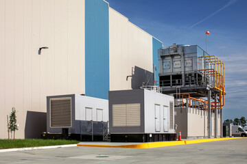 refrigeration system and two electric power generators in exterior of cold storage warehouse