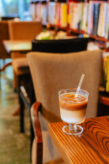 Iced Latte Moment in a Cozy Book Cafe