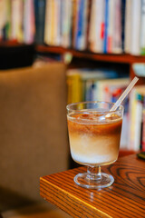 Iced Latte Moment in a Cozy Book Cafe