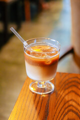 Iced Latte Moment in a Cozy Book Cafe