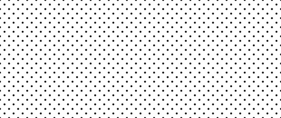 Background with monochrome dotted texture. Polka dot pattern template