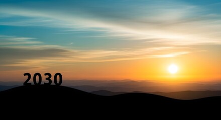 Sunset over mountain range with year twenty thirty concept for future goals and aspirations
