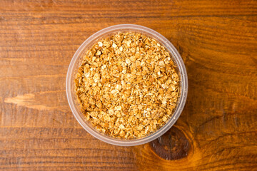 Plain granola in a container