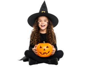 Halloween Joy: Child with Carved Pumpkin and Witch’s Hat

