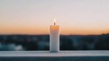 A solitary candle casting a soft, warm glow against a blurred cityscape, symbolizing hope and remembrance in a moment of serene contemplation. - Powered by Adobe