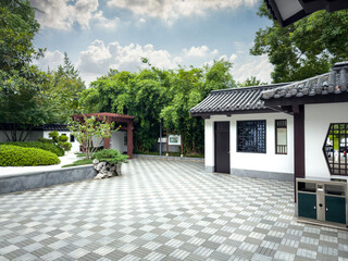 Elegant Tranquility: A Serene View of an Asian Garden with Traditional Architecture