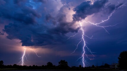 Dramatic Lightning Strike Over Dark Storm Clouds and Silhouetted Landscape