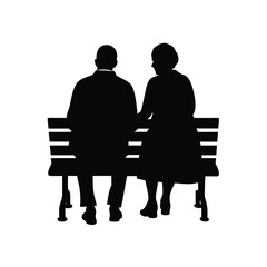 elderly couple holding hands silhouette on a bench
