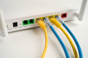 Ethernet cable with wireless router connect to internet service provider network.