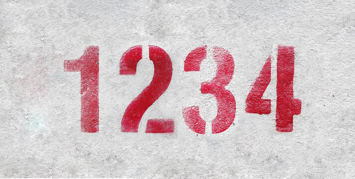 number 1234 . Red spray paint the white wall